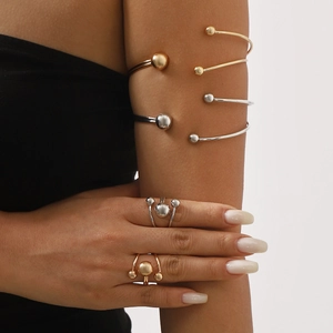Minimalist double-layered gold and silver ball arm cuffs and matching ring set
