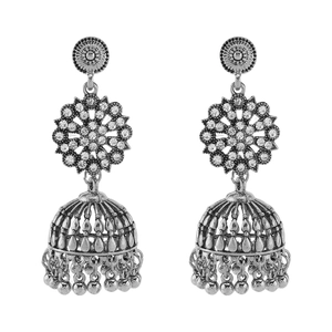 Close-up of vintage silver Jhumka earrings with bohemian floral rhinestones and bells