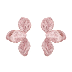 Close-up of pink marble texture on artistic petal-shaped drop earrings with a golden finish