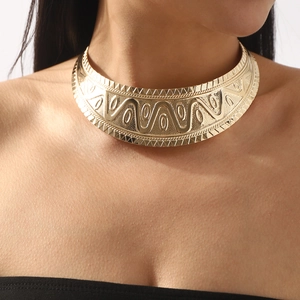 Engraved wide gold choker necklace featuring bohemian geometric patterns and textures