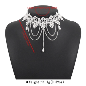 Detailed view of white floral lace choker with silver chains, pearls and size specs