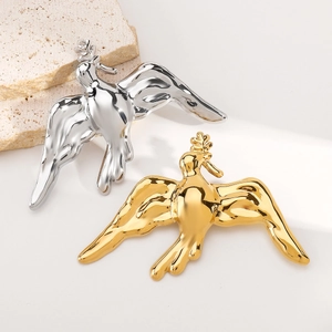 Vintage style gold and silver flying bird brooches in high polished stainless steel