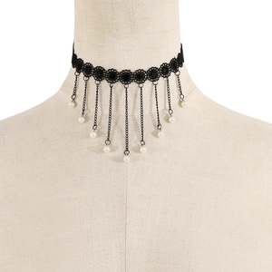 Detail view of gothic black lace choker featuring metal chains and white imitation pearls