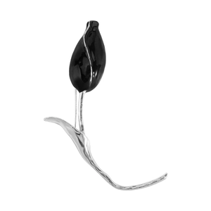 Close-up of a modern tulip brooch with black enamel petals and silver metallic stem