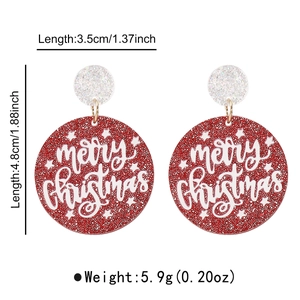 Détail des boucles d'oreilles en acrylique rouge pailleté avec texte Joyeux Noël et mesures