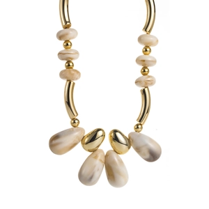 Detail of bohemian acrylic marbled beads and gold plated metal drops on a necklace
