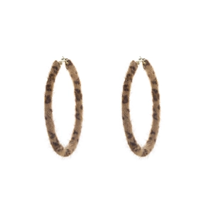 Close-up of leopard print faux fur hoop earrings with gold metal fasteners on white background