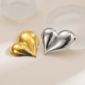 Broches cœur asymétriques minimalistes en acier inoxydable en finitions or et argent