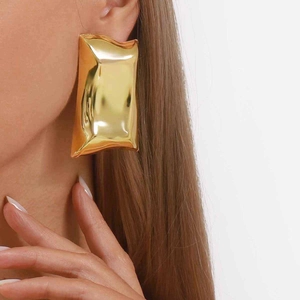 Polished gold oversized rectangular pillow earrings for women in a minimalist style