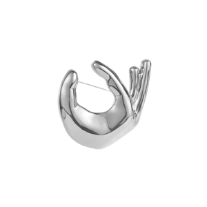 Polished silver metal brooch with elegant hand gesture design for clothing accessory