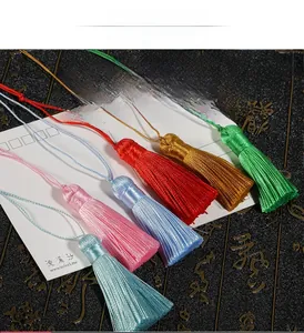 Macro shot of colorful silky DIY tassels for bookmarks and vintage Chinese fans