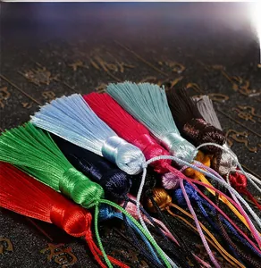 Close-up of colorful silk tassels in various vibrant hues for traditional DIY crafts