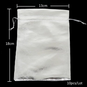 Silver drawstring organza gift bag measuring 13x18cm with metallic woven texture details