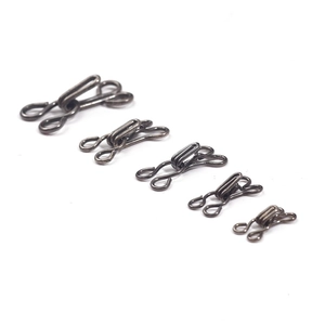 Five sizes of antique silver metal hook and eye fasteners for clothing closures