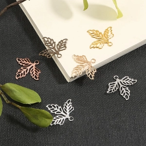 Hollow copper maple leaf charms in gold and silver for DIY jewelry and hair accessories