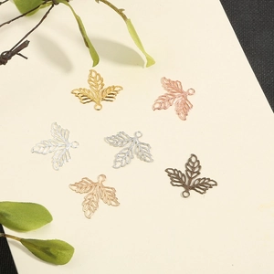 Hollow maple leaf metal pendants in various colors for DIY jewelry and hair accessories