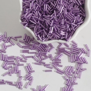 Vibrant purple bugle beads in high-gloss finish for DIY jewelry making and embroidery