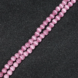 Pink cat eye stone round beads for DIY jewelry making with smooth surface and luster