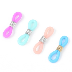 Detailed set of four colorful silicone eyeglass chain connectors with metal coils