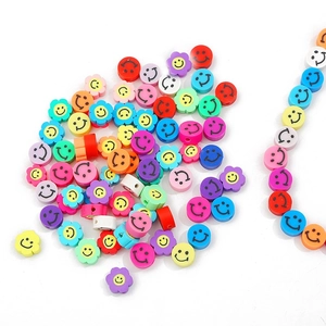 Colorful polymer clay smiley face beads in flower shapes for DIY jewelry making