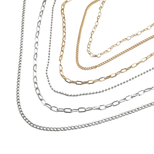 Assorted gold and silver iron chains including paperclip and cross links for DIY jewelry