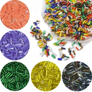 Colorful glass bugle beads in various colors for DIY jewelry making and embroidery