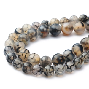 Natuurlijke zwarte drakenader agaat ronde kralen voor handgemaakte DIY sieraden op wit decor