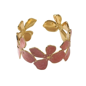 Adjustable gold stainless steel bangle featuring pink enamel flower designs for women