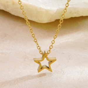 Minimalist gold star hollow pendant necklace featuring a delicate stainless steel cross chain