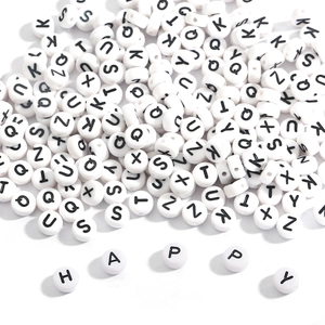 White acrylic flat round alphabet beads with black letters for DIY jewelry making