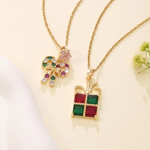 Christmas bow candy cane and gift box pendants with colorful crystals on gold necklaces