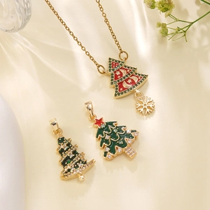 Detail of Christmas tree pendants with zircon inlays and colorful enamel finish