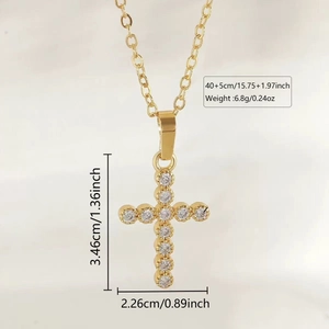 Detail of gold cross pendant with 12 zircons including dimensions and weight markings