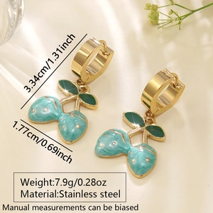 Cute cherry earrings in stainless steel with blue marble enamel finish and gold accents