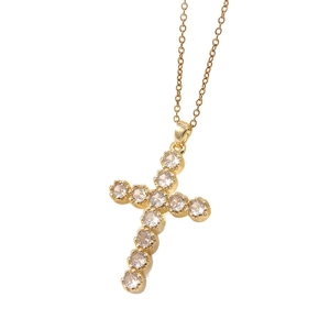 Elegant gold cross pendant necklace with sparkling cubic zirconia stones on an O-chain