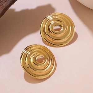 Modern gold spiral stud earrings with polished mirror finish in a geometric design