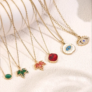 Set of gold stainless steel necklaces with green and red zircon geometric pendants
