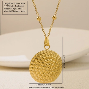 Golden stainless steel necklace with hammered round pendant and beaded chain detail