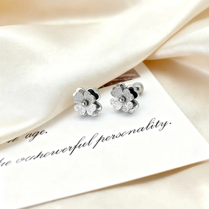 Exquisite stainless steel frosted flower stud earrings with a shimmering silver finish