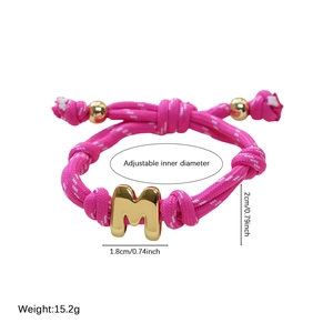 Pink braided cord bracelet with gold 18k plated M letter pendant and adjustable strap