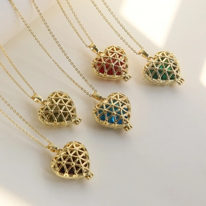 Gold plated brass heart necklaces featuring colorful birthstones and geometric hollow patterns
