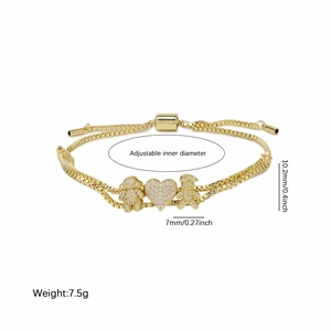 Bracciale regolabile in oro con ciondoli a cuore e bambini con pietre di zircone lucido