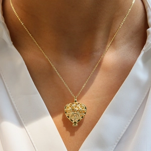 Minimalist heart pendant necklace in gold plated brass with geometric 3D mesh design