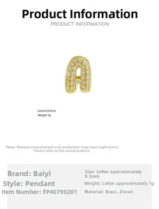 Macro detail of a 9.3x6.6mm 18K gold-plated brass bubble letter A pendant with zircons