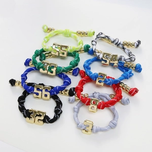 Colorful paracord braided bracelets with gold metal numbers for sports and casual wear