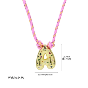 Colorful woven adjustable necklace with golden bubble letter A pendant and sparkling crystals