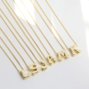 Polished 18k gold plated bubble letter pendant necklaces with delicate cross chains