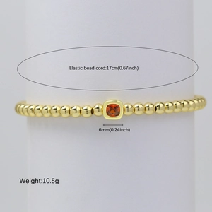 Pulsera de cuentas doradas con piedra de nacimiento naranja cuadrada y medidas de talla