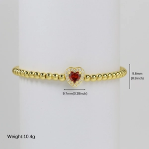 18k gold beaded bracelet with heart-shaped red gemstone and white zircon setting