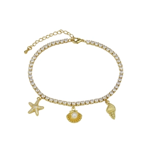 Detail of gold seashell starfish anklet featuring cubic zirconia tennis chain design